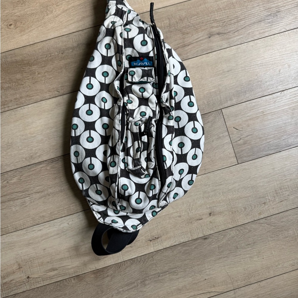 Kavu Canvas Sling Bag Backpack in Brown and Teal